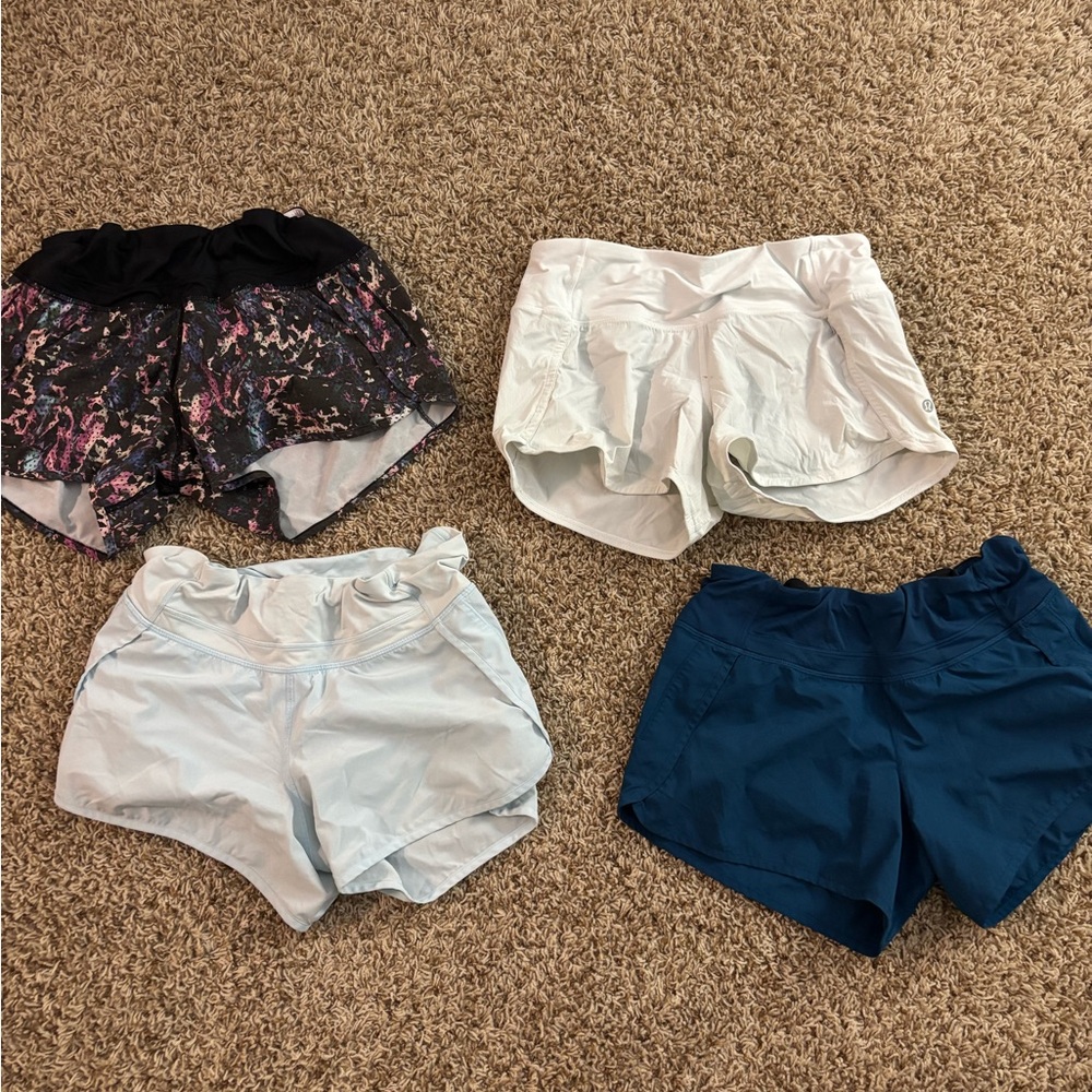 Women's Athletic Shorts white,dark blue, light blue, and patterned EACH $20
